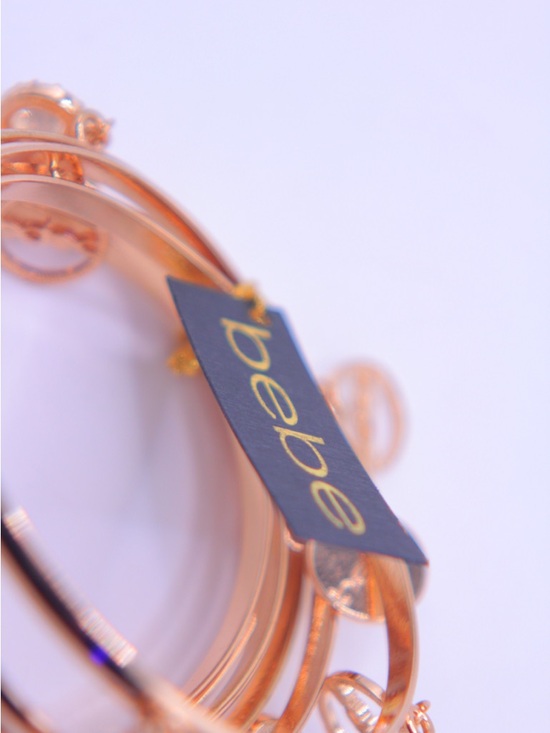 bebe Gold tone Multi-Charm Bangle Set - Picture 4 of 6